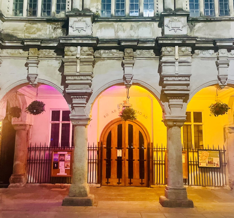 Exeter Guildhall lit up in RWC 2025 colours to mark 1 year to go